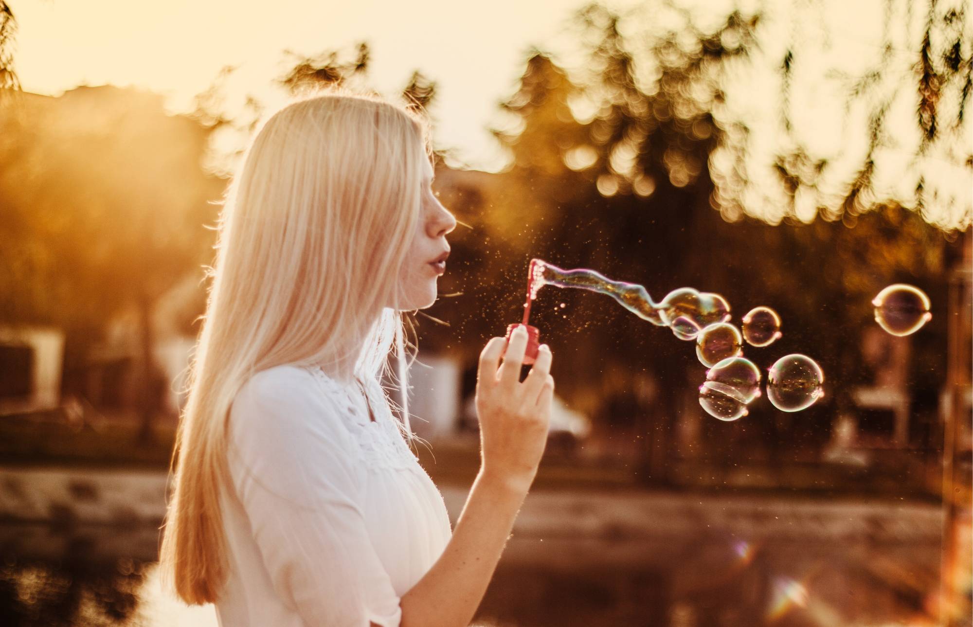 Lady blowing bubbles