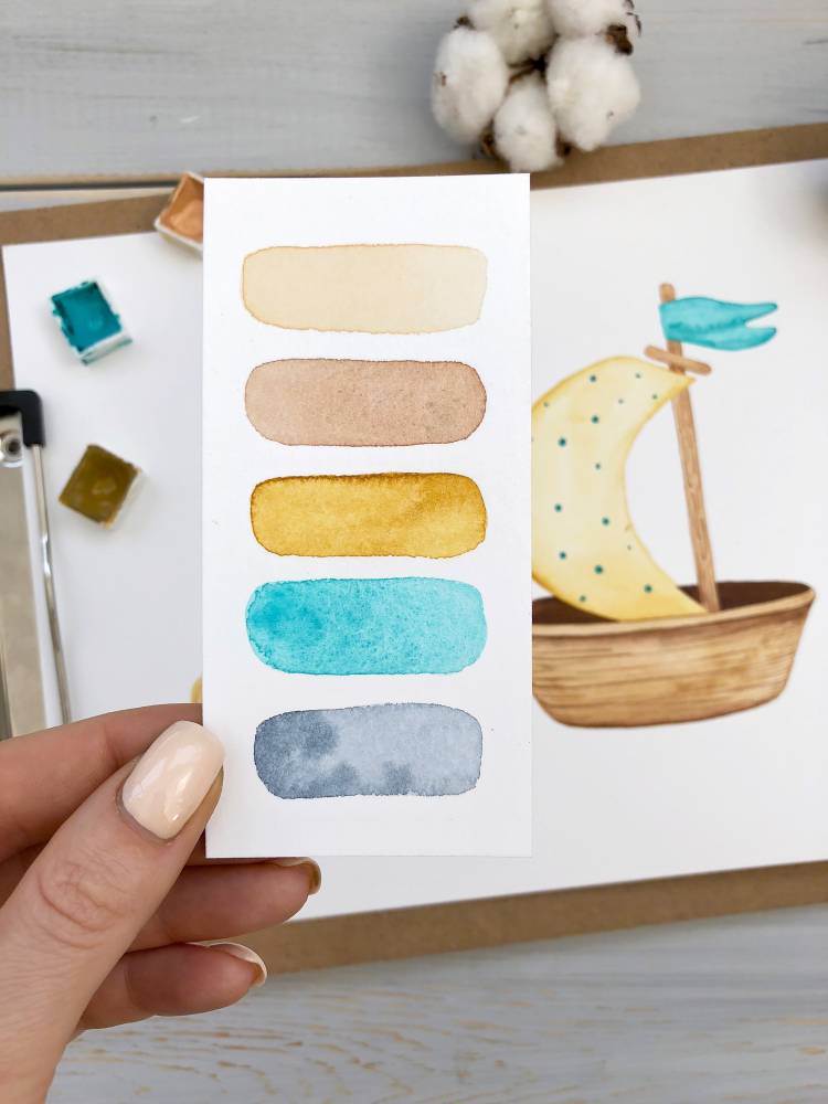 Person holding watercolor card