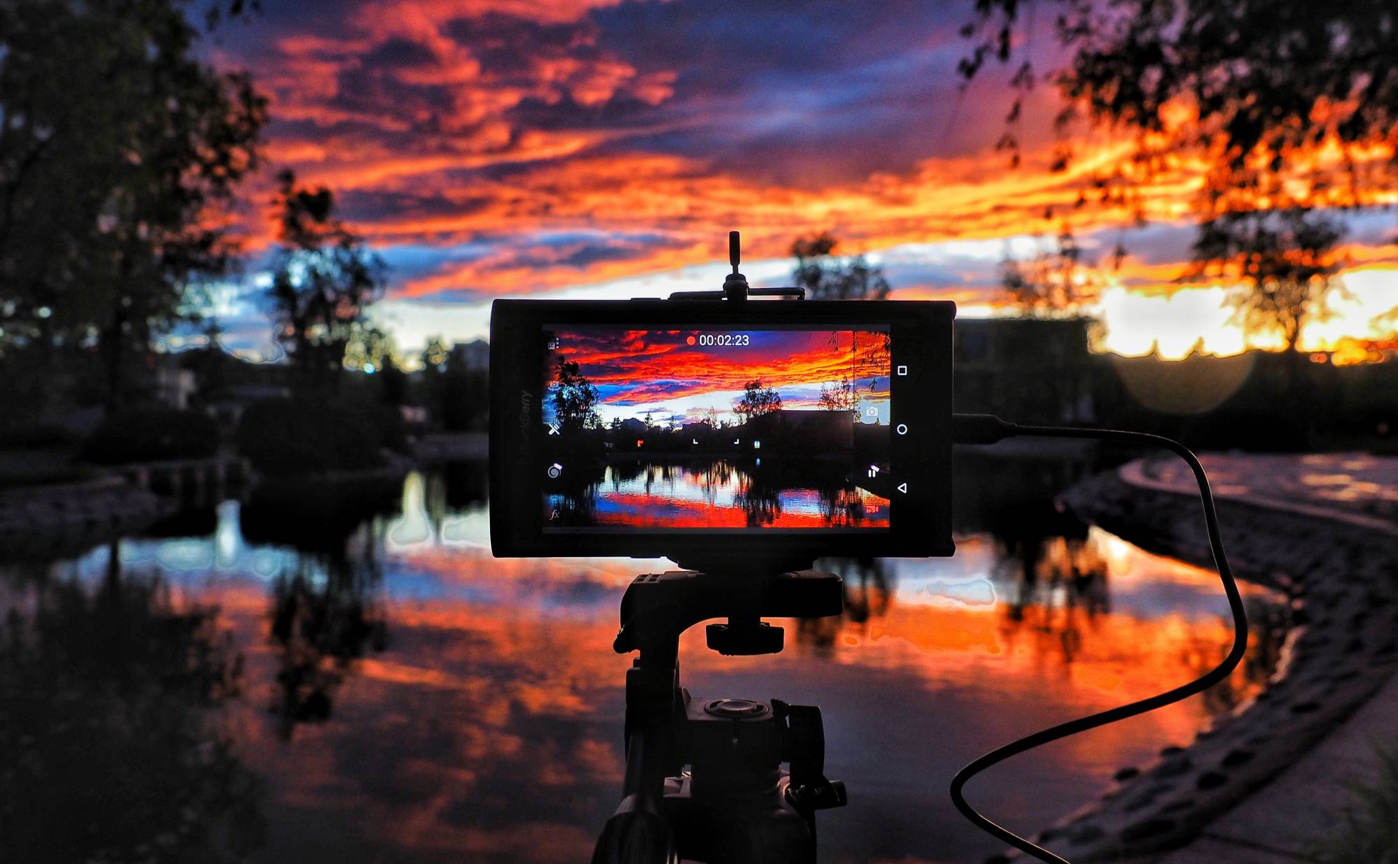Camera on tripod setup during golden hour